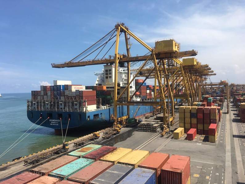 containers waiting to be loaded onto a freighter